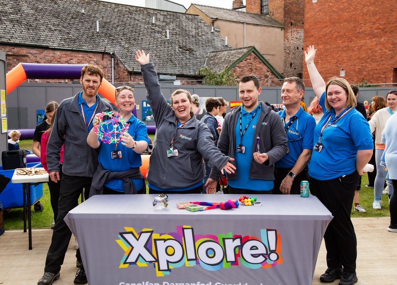 Six of the Xplore! team at a community event