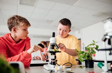 Children with microscope